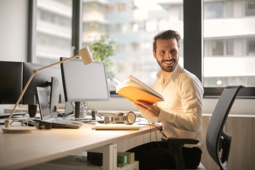 An insurance agent working at a desk